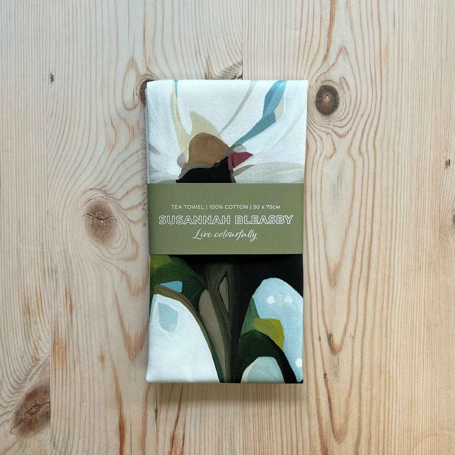 light blue cotton tea towel folded