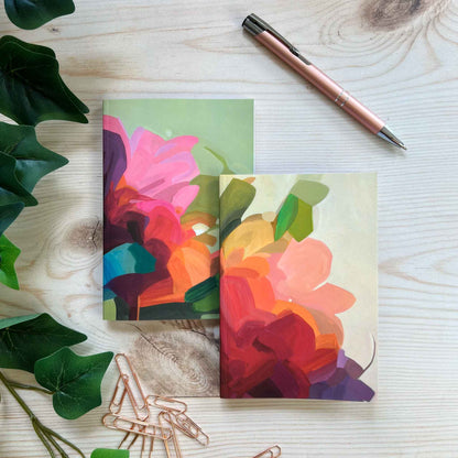 A6 softcover notebooks with green and yellow abstract floral designs