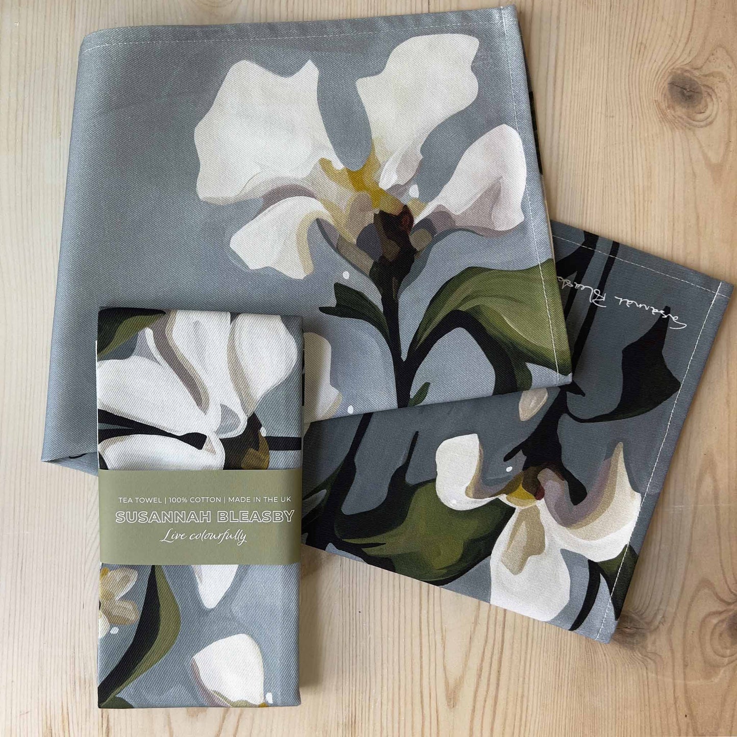 british floral tea towels with white flowers on grey background