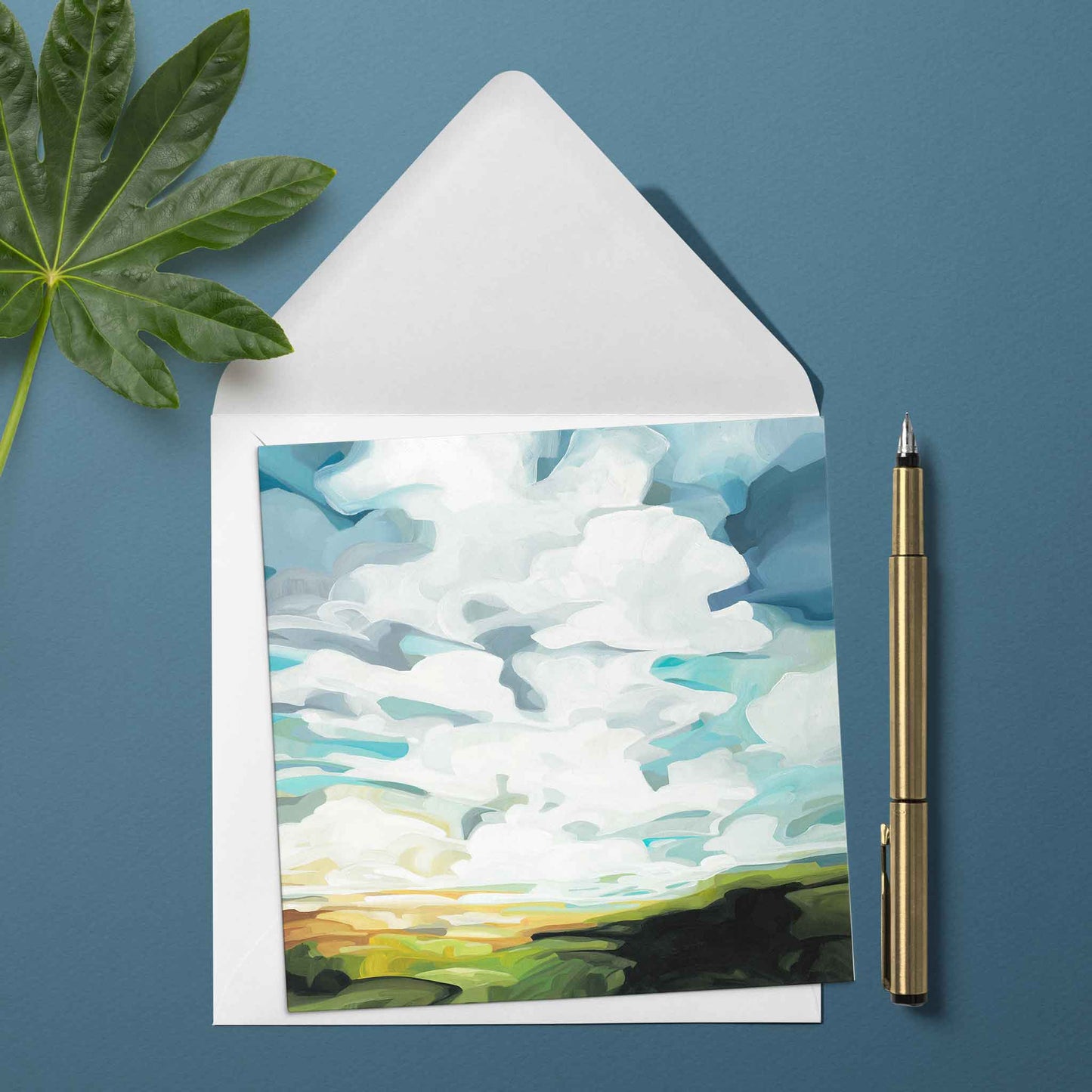 art greeting card with painting of green hills and sunshine